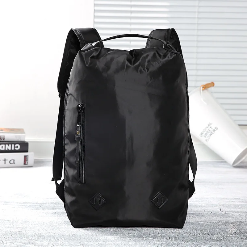 

2019 new personality high-capacity backpack solid color men's and women's portable backpack