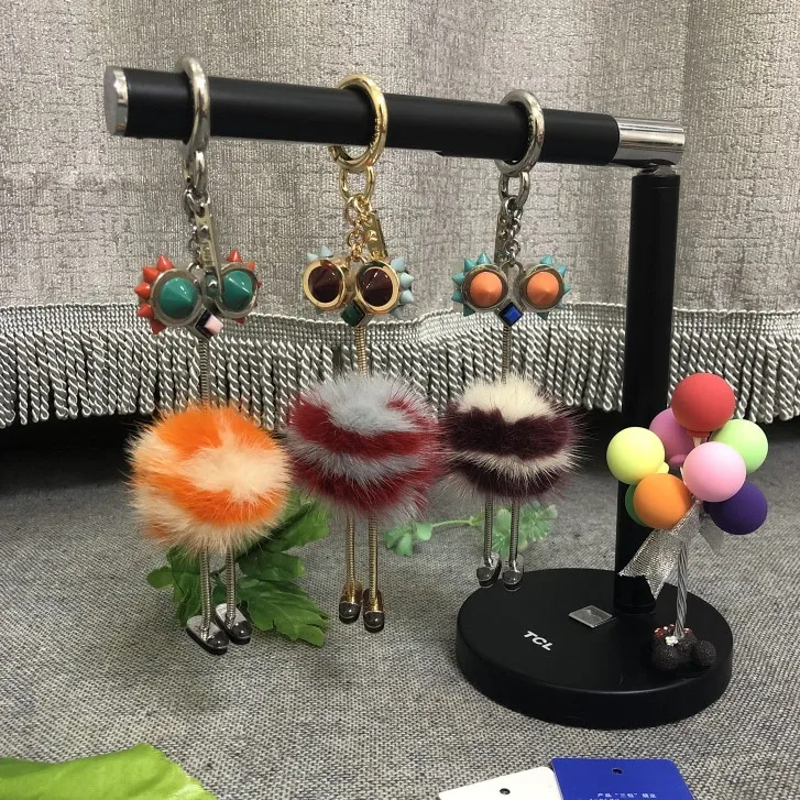 

real mink fur key chain ostrich cute robot animal bird metal fen di key chain handbag pendant pom pom fur bag ornament