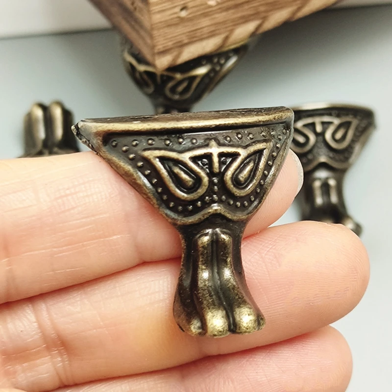 Furniture hardware Furniture corner protector Wood box feet protector Metal decorative protectors 4pcs Antique Brass Jewelry Chest Wood Box Cabinet Decorative Feet Leg Corner Protector Metal Crafts for Furniture Hardware