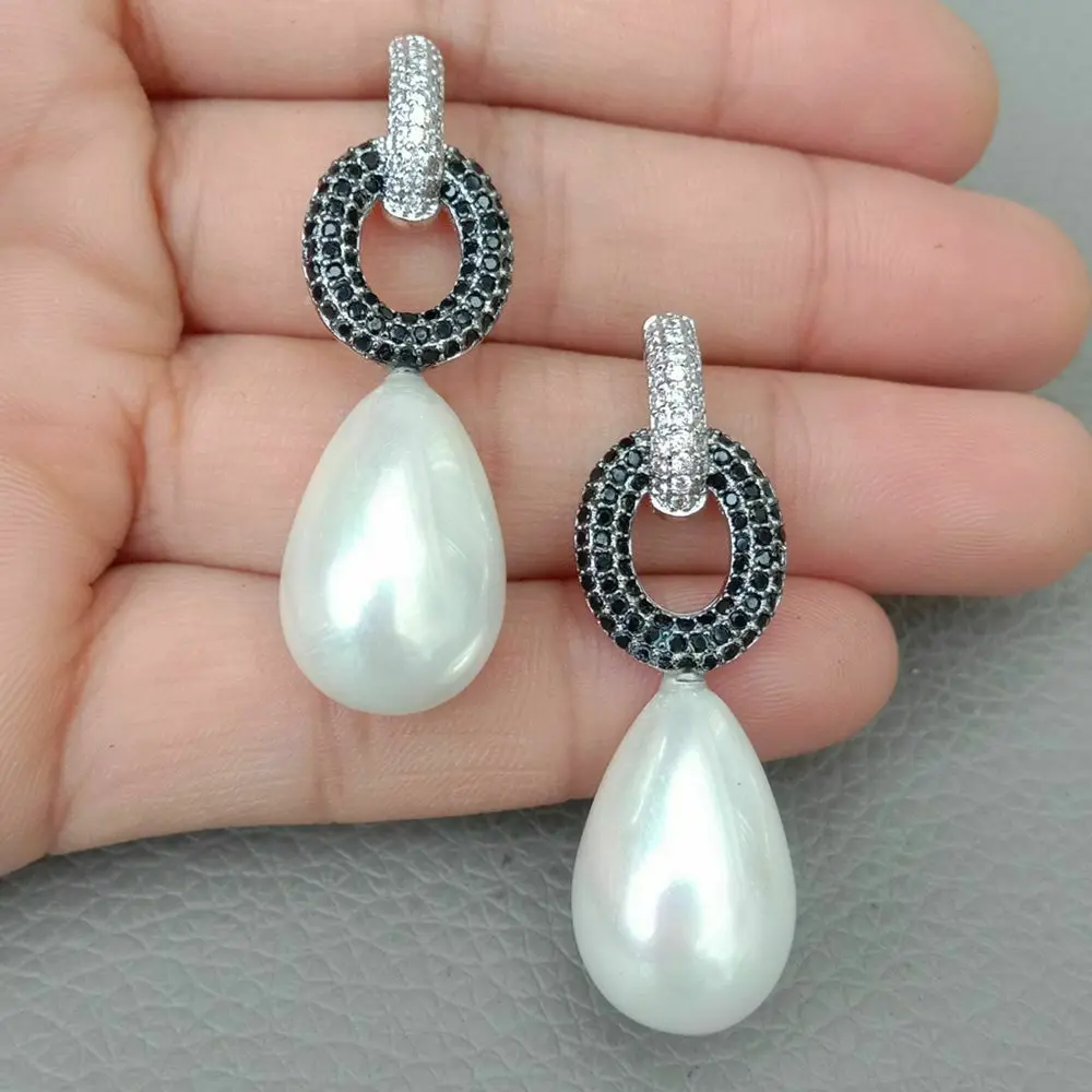 

Teardrop White Sea Shell Pearl Cz pave Stud Earrings