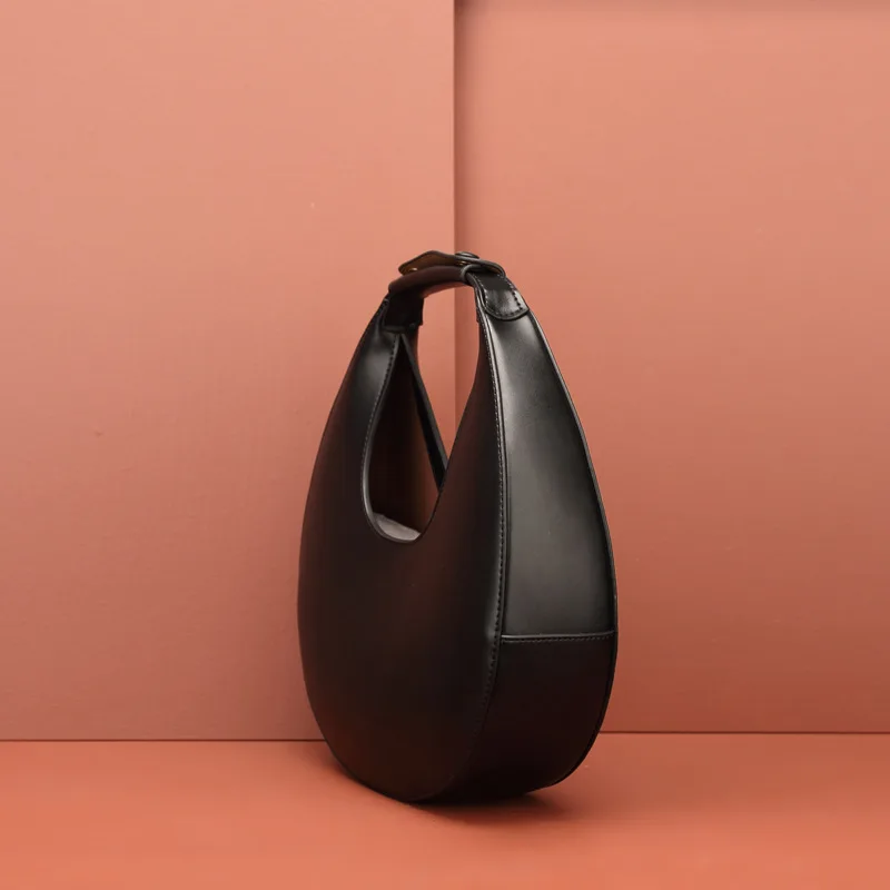 European and American fashion niche design catwalk moon bag new personality wild simple arc handbag