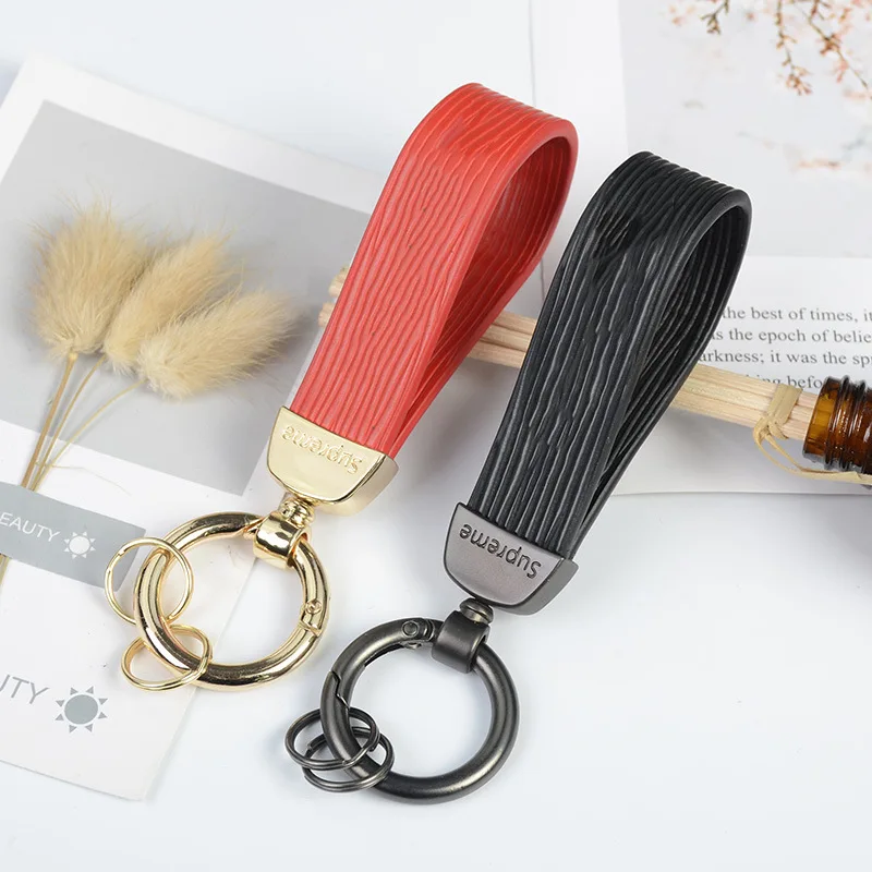 

Creative Gifts Activity Gift Keychain Lettered Popular Brand Automobile Hanging Ornament Promotional Items Cowhide Key Chain Cus
