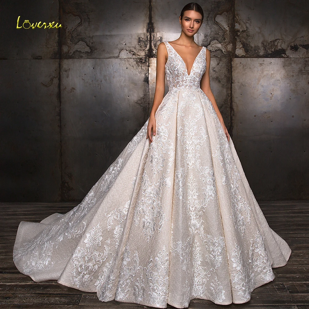 

Loverxu V-Neck A Line Wedding Dresses 2019 Appliques Beading Tank Sleeve Backless Bride Dress Chapel Train Bridal Gown Plus Size