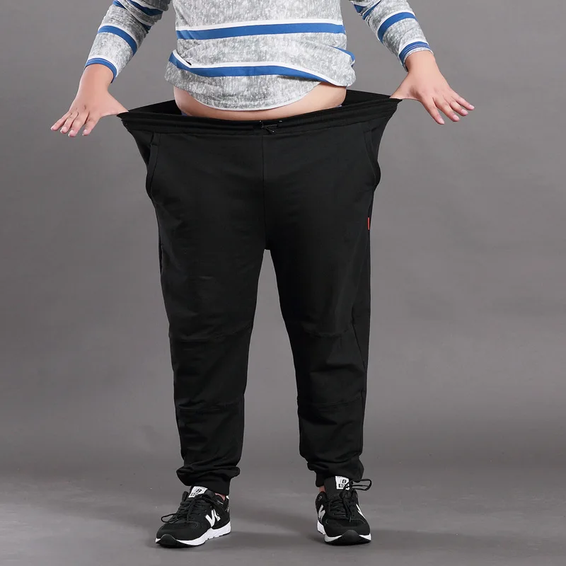 Men Big Size Solid Sweatpants Spring Elastic Narrow Feet Stretch Pants Loose Plus Size Casual Cotton Jogger Trousers 5XL 6XL 7XL Men Big Size Solid Sweatpants Spring Elastic Narrow Feet Stretch Pants Loose Plus Size Casual Cotton Jogger Trousers 5XL 6XL 7XL