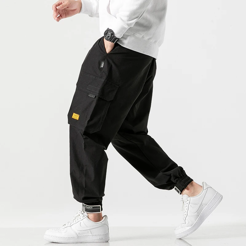 

Men Cargo Pants 2019 Mens Streetwear Hip Hop Baggy Pockets Ribbon Joggers Pants Men Japanes Style Overalls Black Harem Pants 5XL