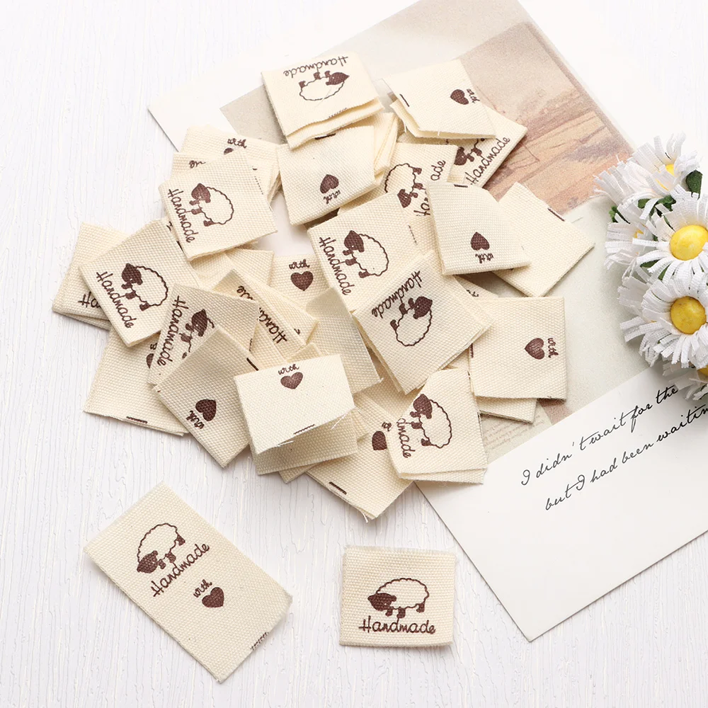 Description Picture 5 of item50PCS Heart Shape Cloth Garment Labels Cartoon Pattern Handmade With Love Clothing Tags Woven Knitted Supplies Sewing Accessory