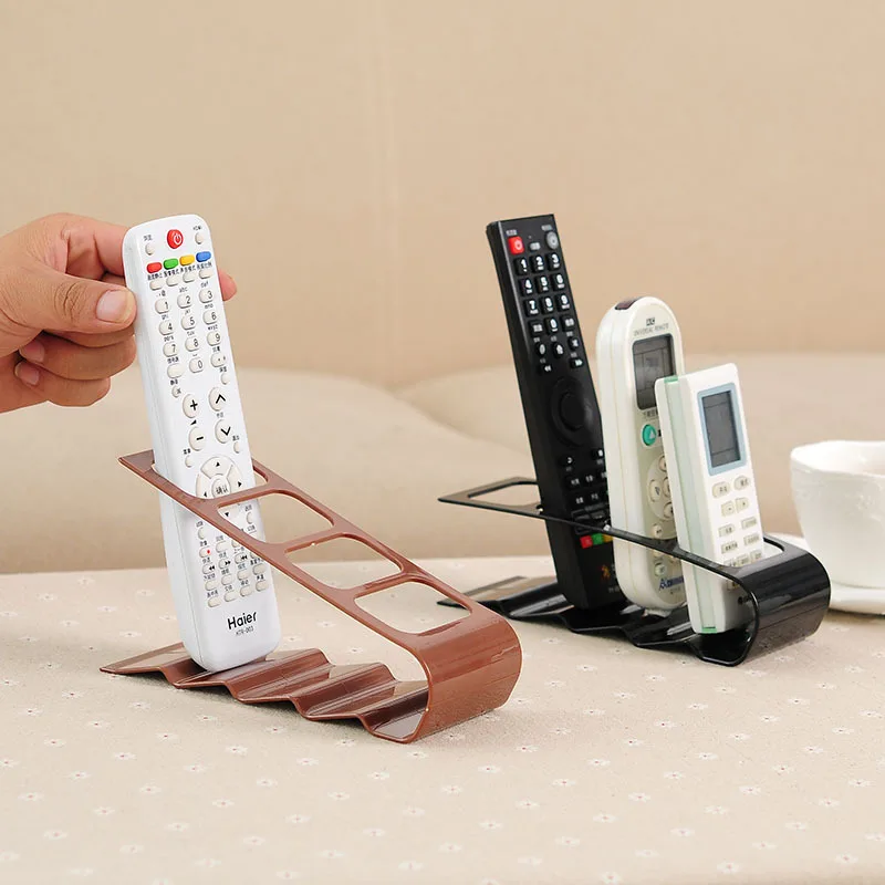 

1PC New TV DVD Step Practical Four Remote Control Frame Plastic Remote Control Bracket Mobile Phone Holder Stand Rack Up To 4