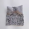 leopard gray bow