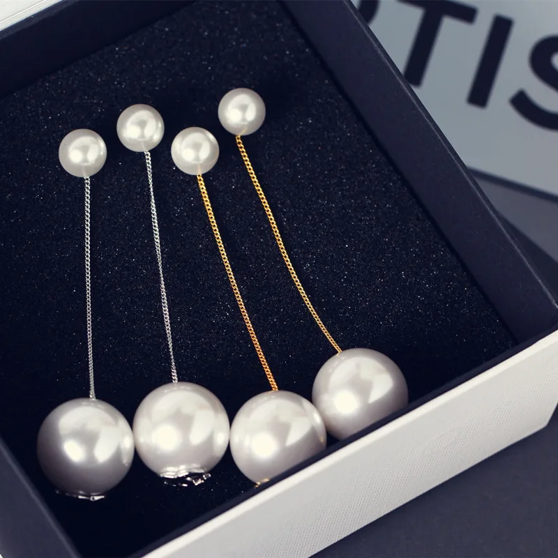 Минималистская корейская версия S сочетается с длинным жемчужным серёжкой размером с жемчужную серёжку с жемчужным серёжкой и жемчужным серёжкой в форме сережек