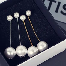 Минималистская корейская версия S сочетается с длинным жемчужным серёжкой размером с жемчужную серёжку с жемчужным серёжкой и жемчужным серёжкой в форме сережек