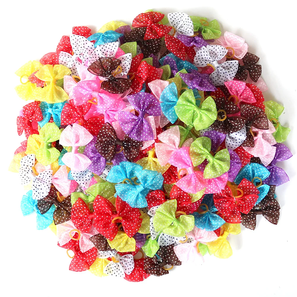 

50pcs dog topknot bows pet hair Rubber bands Patterns Large Bowknot Style dog hair accessories pet grooming products