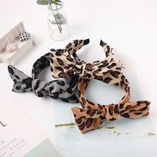 Turbante de cabeza ancha anudada a la moda con lazo estampado de leopardo de pana de Otoño Invierno para mujeres y niñas accesorios para el cabello(China)