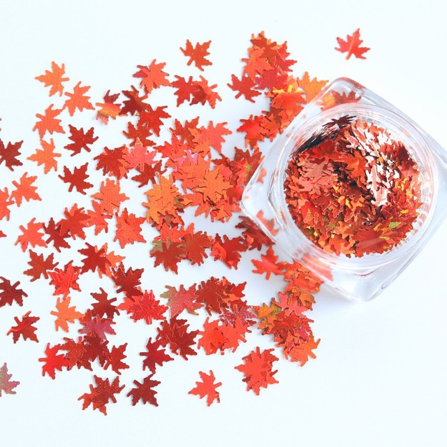 box with 12 styles of color laser maple leaf nail sequins Holographic Metallic Leaf Glitter Sequin Nail Art Patch Decoration