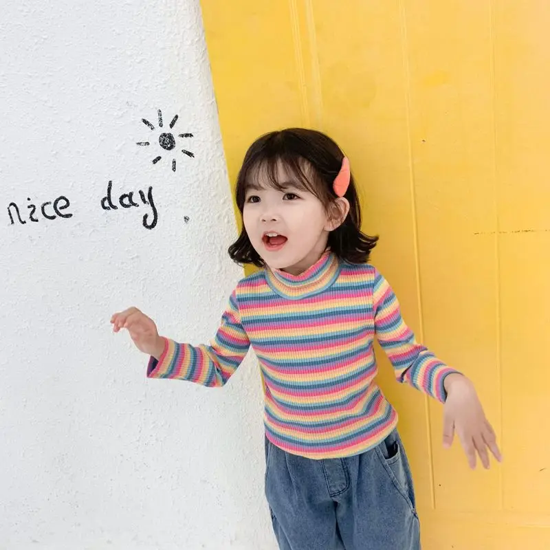 

2019 Korean version of the girl spring and autumn wild cotton rainbow striped pit wood ear long-sleeved T-shirt bottoming shirt