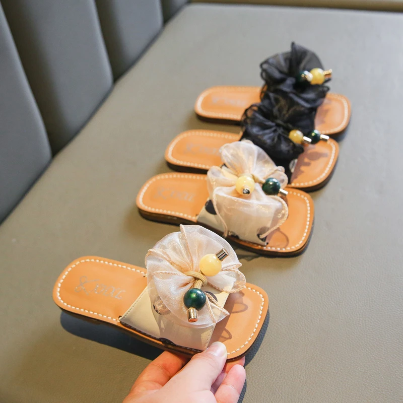 

Girls Fashion Slippers 2021 New Summer Kids Bowtie Pu Leather Anti-slip Rubber Soft Princess Flat Shoes Beach Slippers Baby Shoe