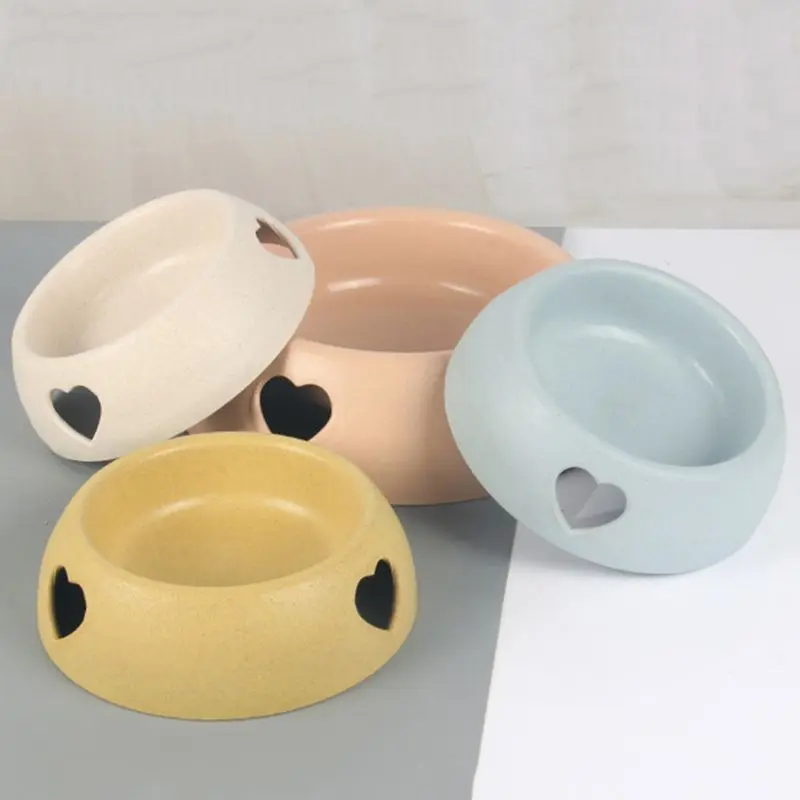 

Round Simple Design Creative Cat Food Bowl Openwork Love Plastic Cervical Vertebra Protection Oblique Mouth Pet Feeding Cute Kit
