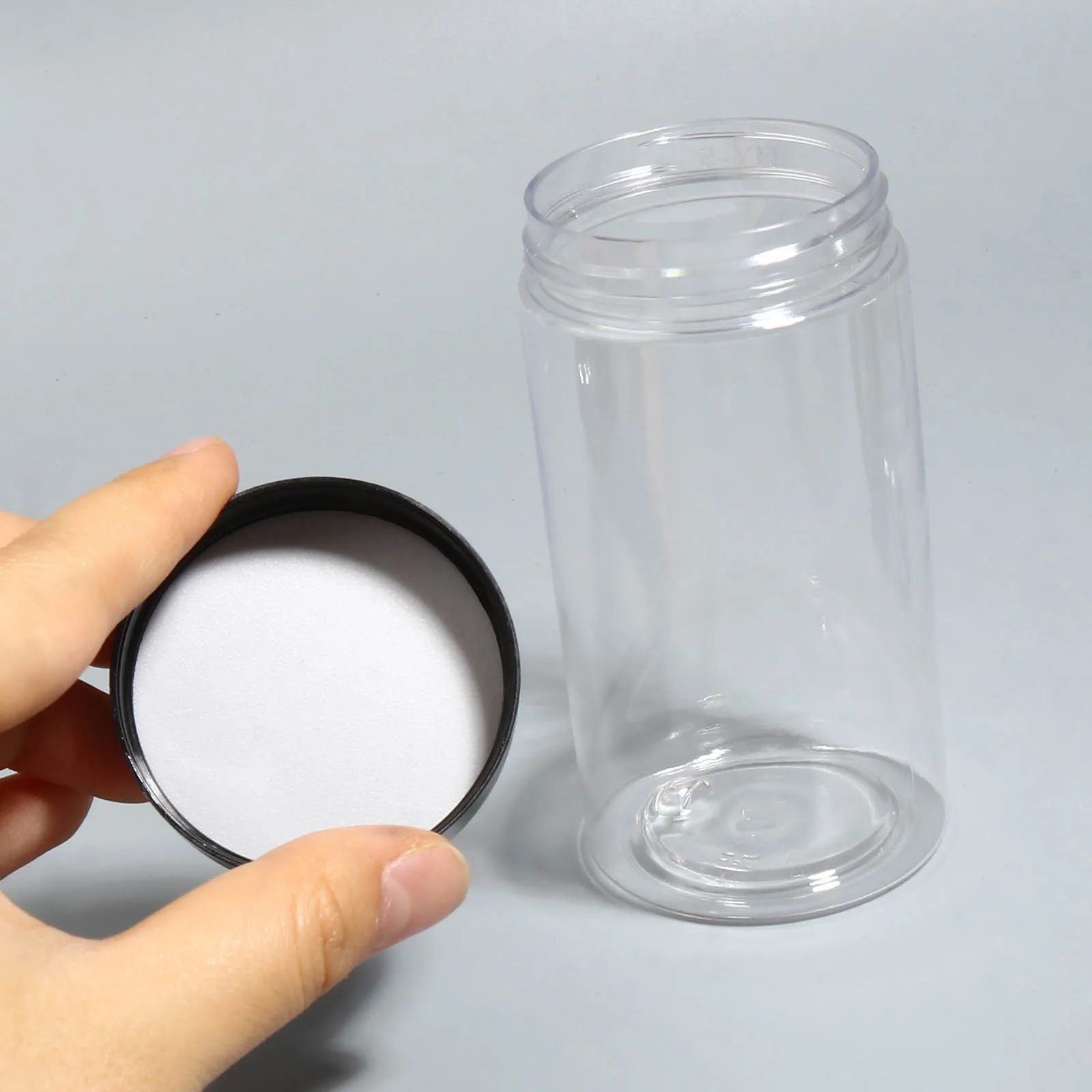 https://ae01.alicdn.com/kf/H85930067564541cc84a15b095bd8c7b1F/2pcs-Empty-Jewelry-Cosmetic-Jars-100-120-150ml-Black-Lid-Plastic-Refillable-Makeup-Balm-Container-Travel.jpg