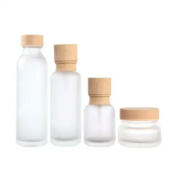 

Simple Frosted Glass Bottle Portable Makeup Tool Empty Lotion Bottle with Wood Cover BPA Free Clear Refillable Face Cream
