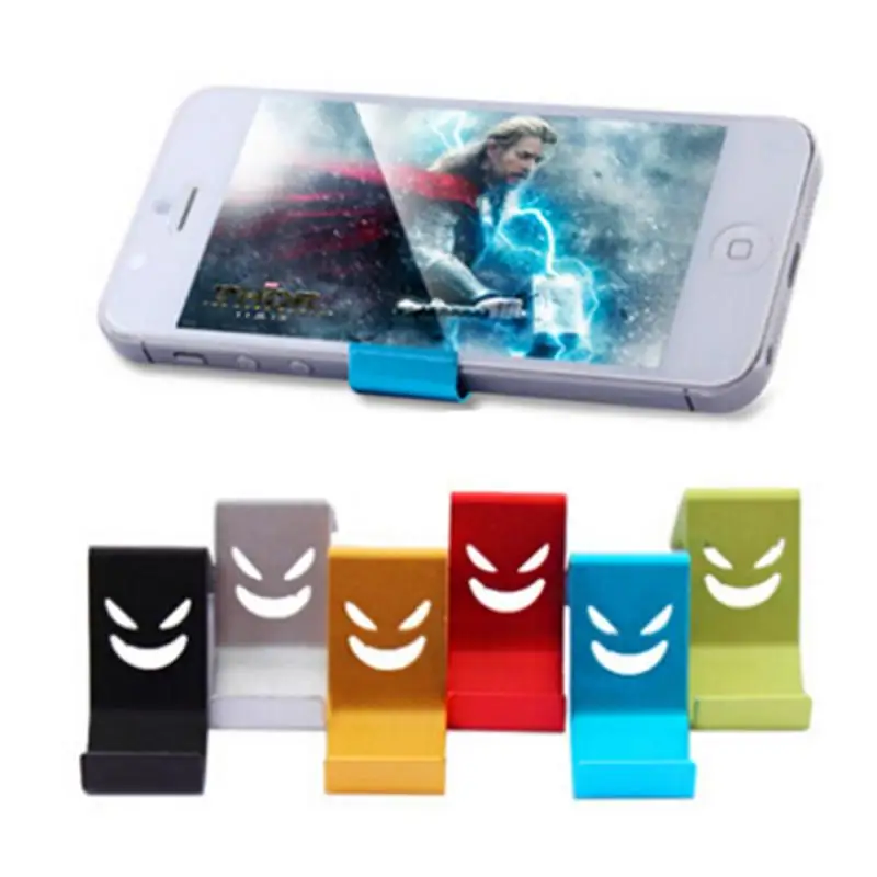

New 1pcs Random Color Metal Devil Smile Universal Mobile Cell Phone Stand Holder Metal Cell Phone Holder For Ipone X Car Stand
