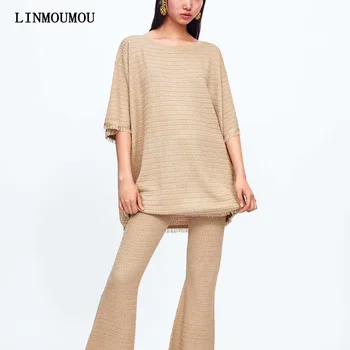 

New fashion ladies tops knit solid color raw edge decorative shirt round neck haif sleeve loose long blouse