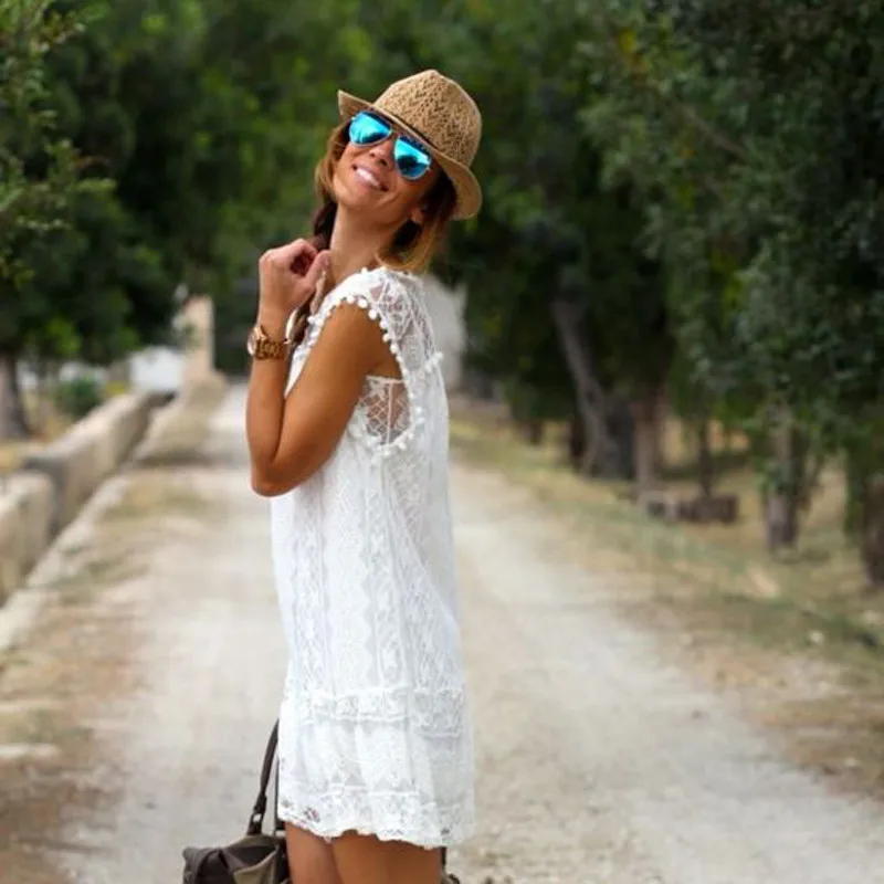 white sleeveless beach cover up