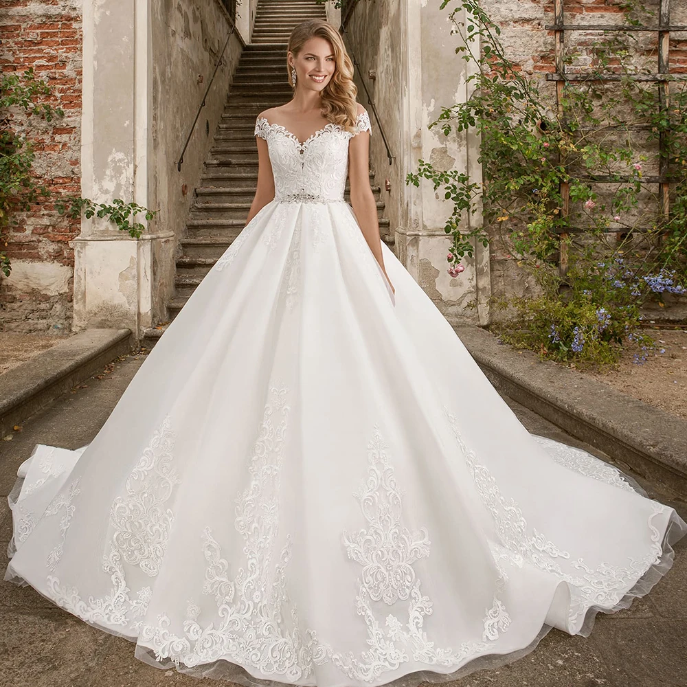 

2020 Hot Special Princess Ball Gown Wedding Dresses Plus Size Mariage Sparkly Beading Crystal Waist Appliques Short Sleeve Dress