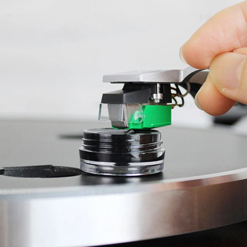 Tap the self adhesive vinyl record player cartridge and stylus cleaner