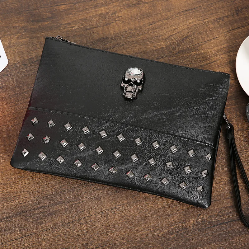 

Handbag male Korean version of the wave society skull rivet hand bag European and American fashion