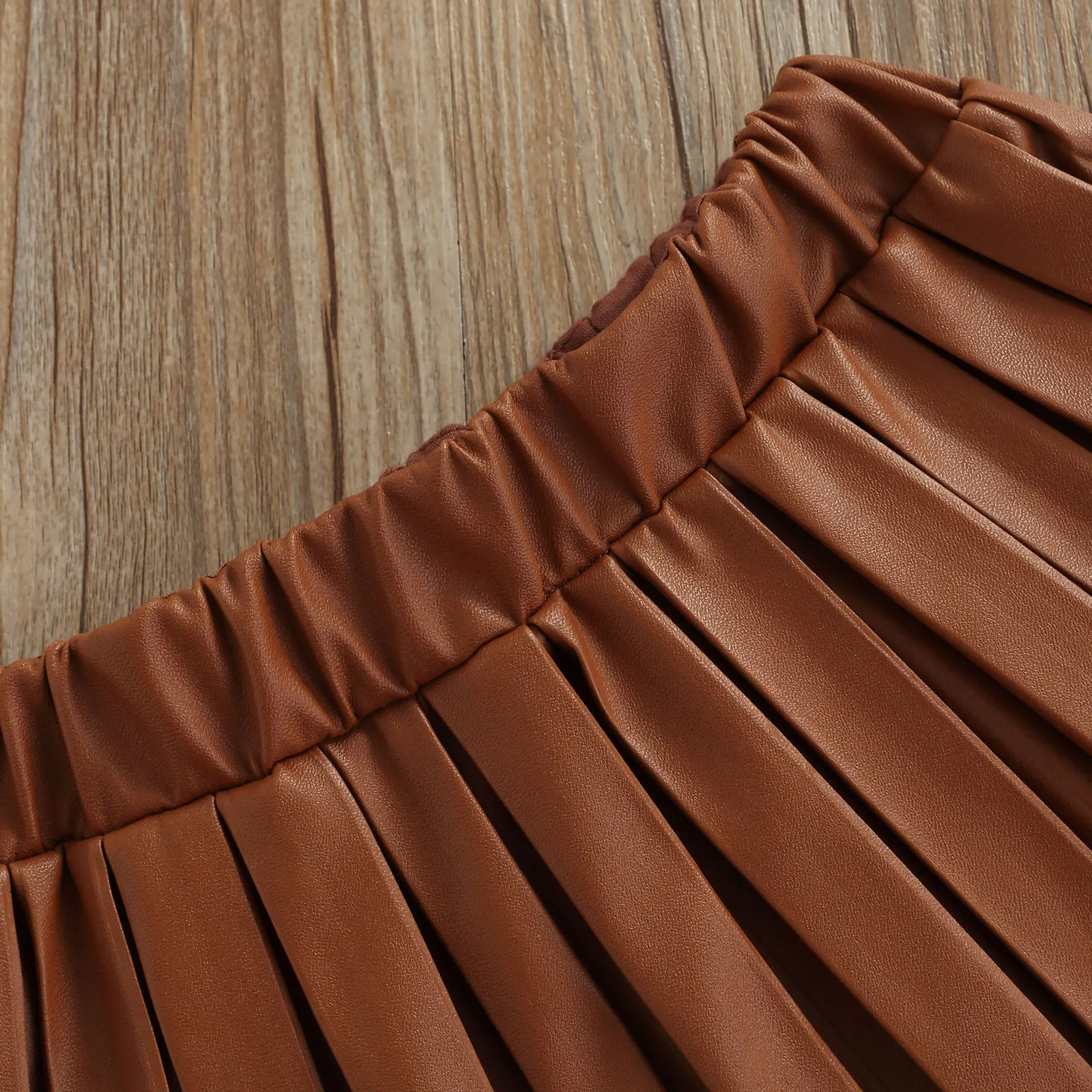 Children Skirts Fashion Baby Girl Skirt Kids PU Leather Elastic Waist Pleated Skirts Toddler Children's Bottom New Fashion Solid Color Skirt