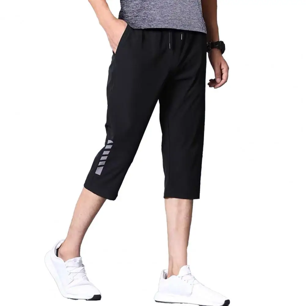 75% Hot Sales 3/4 Pants Solid Color Stretchy Men Drawstring Pockets Cropped Trousers for Sports men solid color sweatpants drawstring pockets ankle tied long pants trousers