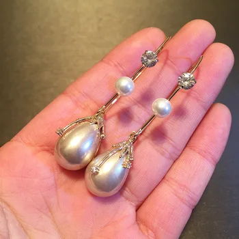 

Korean Temperament Christmas Earrings Net Red Drop-Shaped Pearl Hand-Made New Winding French Small Light Brown Earrings Jewelry