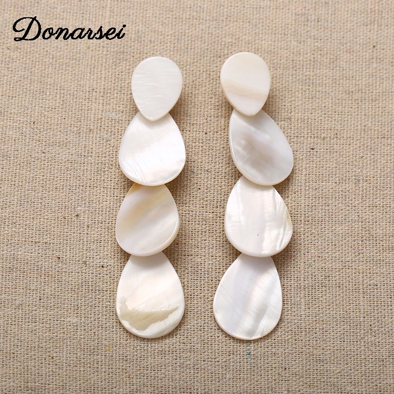 

Donarsei ZA 2019 New Fashion White Shell Long Earrings For Women Beach Cowrie Water Drop Dangle Earrings Statement Jewelry