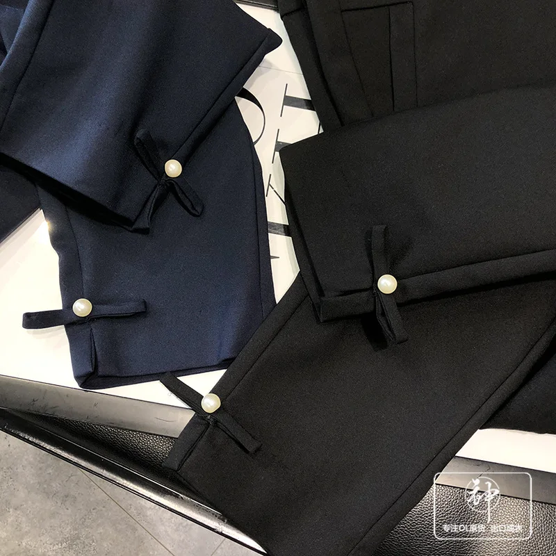 

A Generation of Pearl Clasp Charade Elegant Slim Fit Slimming Slit Drainpipe Jeans Capri Pants Entity