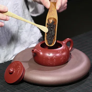 

Zisha yixing teapot handmade master teapot engraved with plum blossom