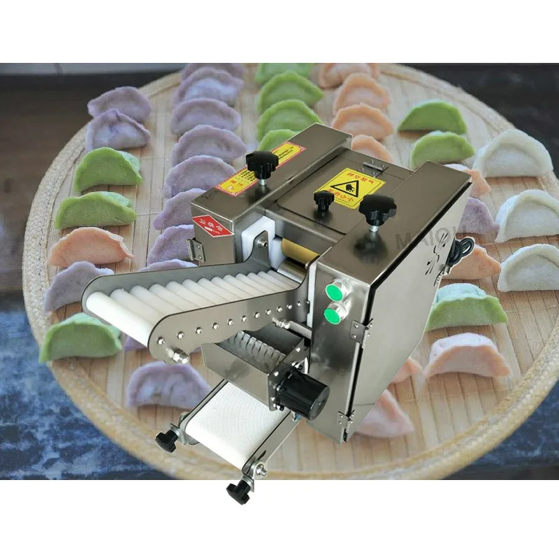 

Dumpling wrapper skin making machine