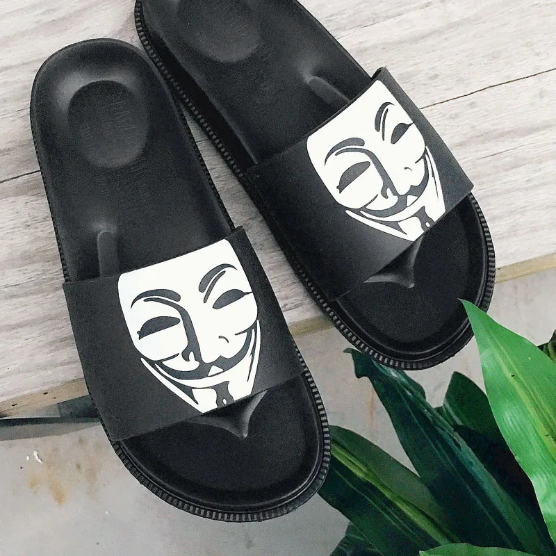 

MOOREGOOD Classic mask men's pattern men's slippers fashion personality outdoor sandals lightweight Korean men's shoes