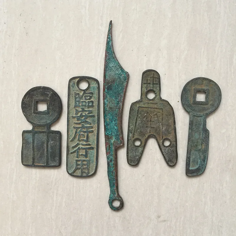 Three-hole coin, a set of five coins, a set of five parts 3