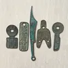 Three-hole coin, a set of five coins, a set of five parts 3