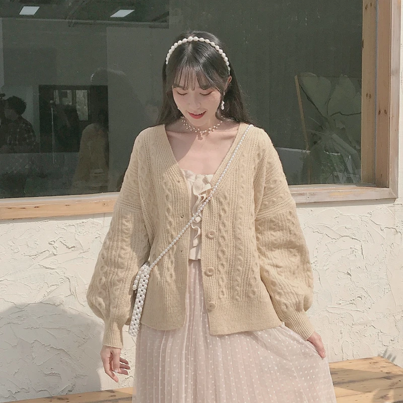 

2019 autumn and winter new Chinese long-sleeved casual solid color loose sweater Female V-neck elegant cardigan jacket cotton