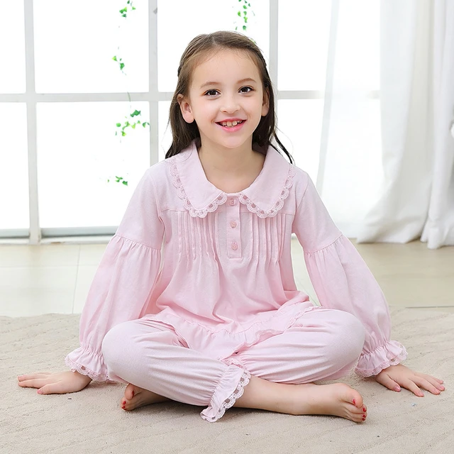 Pyjama ado fille rose avec blouse manches longues à volants et pantalon