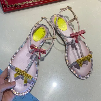 

Dcxnnieh Shiny Crystal studded Flats Sandals women Butterfly Knot flip flops Drilled dress Hot sell summer party beach Shoes