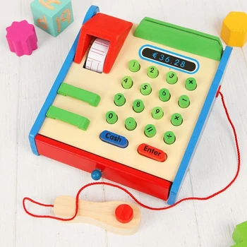 

Wooden toy "cash register", in a set of wooden coins, card, buttons are pressed
