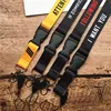 2 в 1 МОБИЛЬНЫЙ ТЕЛЕФОН lanyard брелок для ключей на бретельках со значком шейный платок с уведомлением против потери значки, идентификатор сотового телефона веревка шейные платки ► Фото 2/6