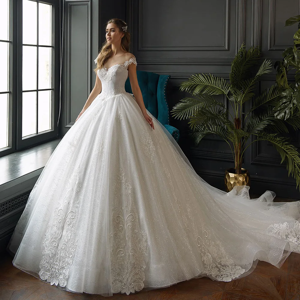 

Shiny Ball Gown Wedding Dresses Robe Mariage Femme Cap Sleeve Lace Up Back Gorgeous Appliques Lace Wedding Gowns Plus Size