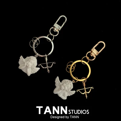 

TANN Original Plaster Angel Keychain Airpods Protective Sleeve Pendant Earphone Shell Hanging Chain Backpack Pendant Buckle Ring