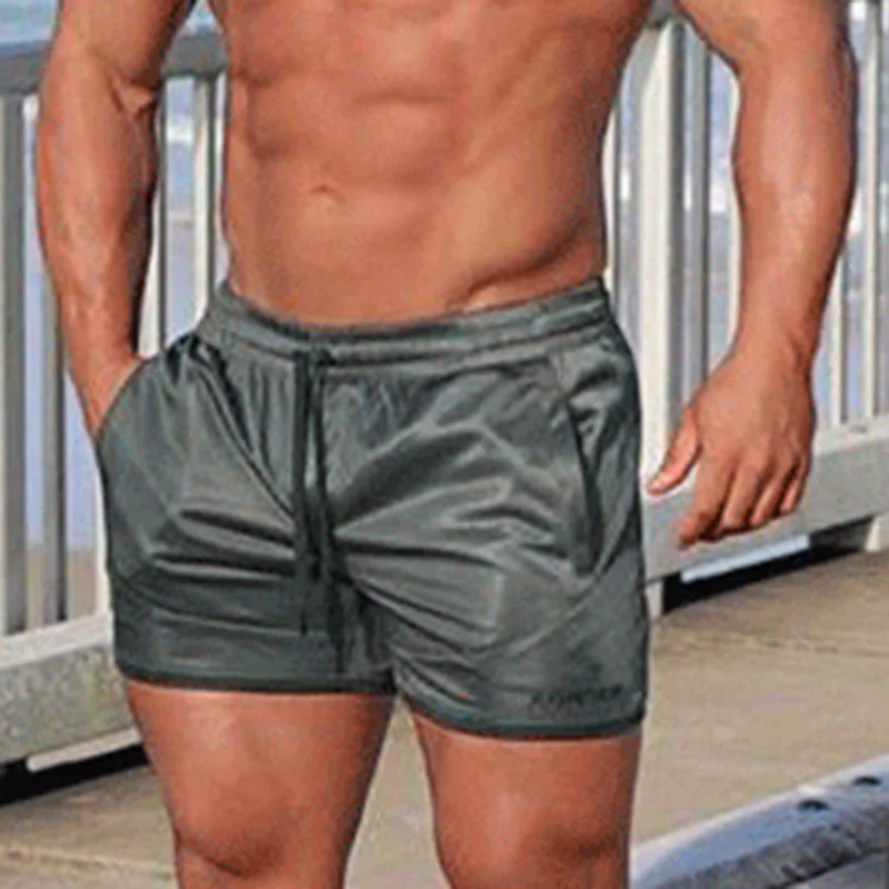 Men Running Shorts Sport Training High Elastic Solid Swimming Shorts Beach Wear Casual Men Workout Soccer Fitness Gym Sweatpants