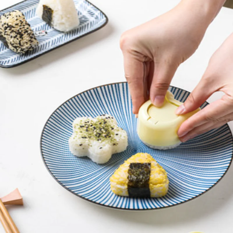 https://ae01.alicdn.com/kf/H87cb92cac5704de1ab59bac4ff423131X/DIY-Sushi-Onigiri-Rice-Ball-Food-Press-Triangular-Maker-Mold-Kit-Japanese-Kitchen-Bento-Accessories-Gadget.png