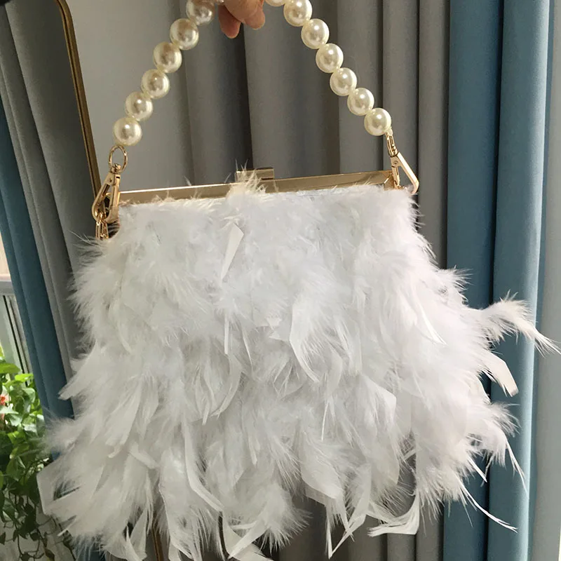 white fluffy clutch