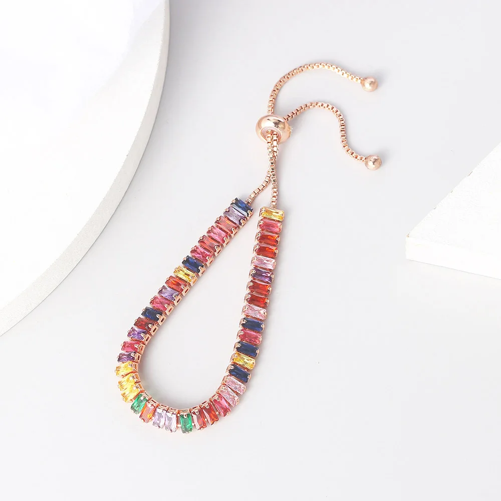 A Rainbow Zircon Chain Tennis Bracelet for Women: A colorful fashion accessory with a gold-plated chain.