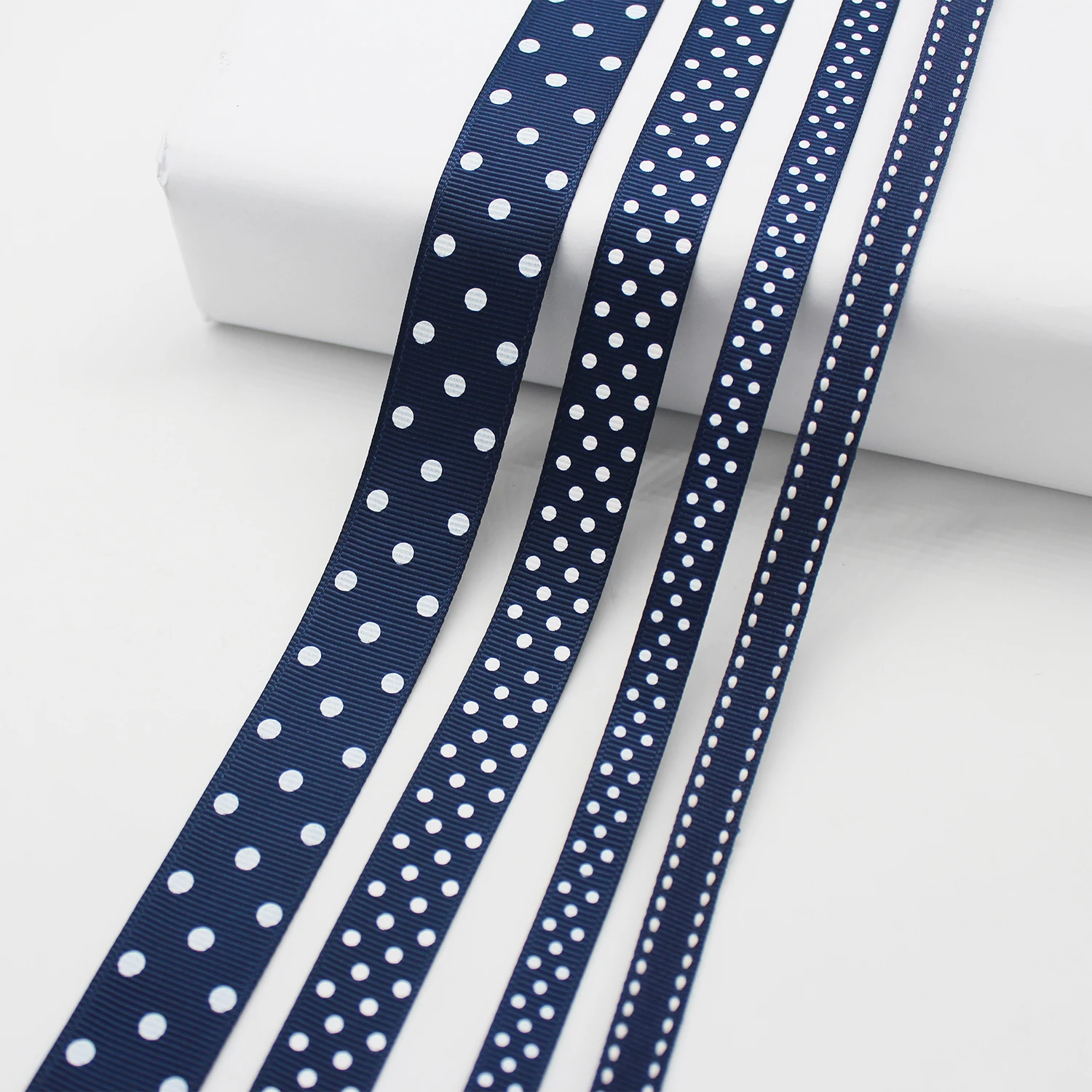 Blue crosses ribbon printed on 5/8 light blue single face satin